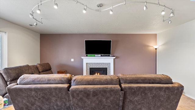 9907 Chelan Ct, Pasco, WA 99301 - carpeted living area with a fireplace and track lighting