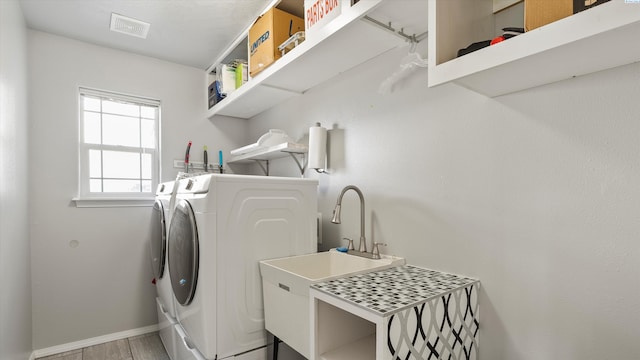 9907 Chelan Ct, Pasco, WA 99301 - laundry room featuring independent washer and dryer and baseboards