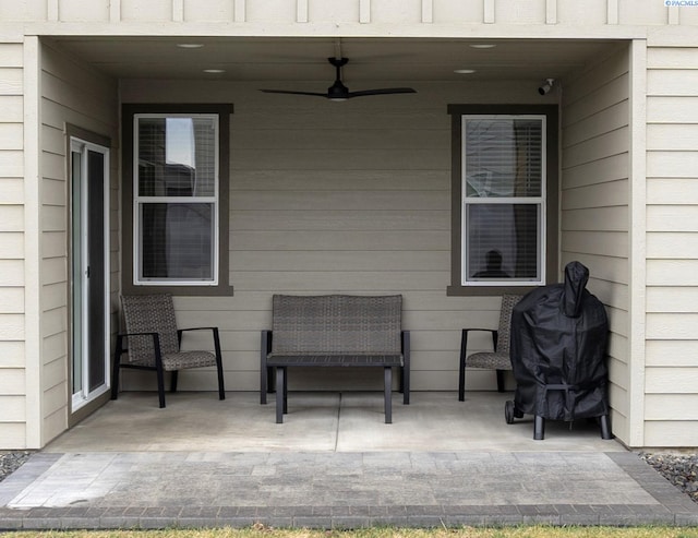 view of patio / terrace with a grill and ceiling fan