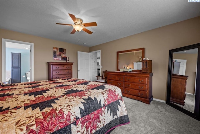 8602 W 1st Ave, Kennewick, WA 99336 - bedroom with carpet, ceiling fan, baseboards, a textured ceiling, and ensuite bath
