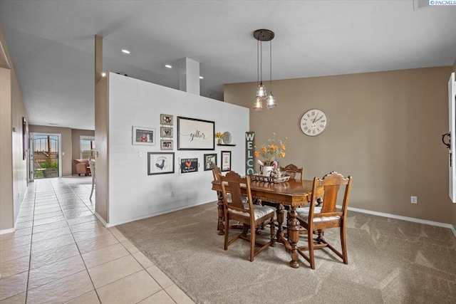 8602 W 1st Ave, Kennewick, WA 99336 - dining area featuring light carpet, baseboards, light tile patterned flooring, and recessed lighting