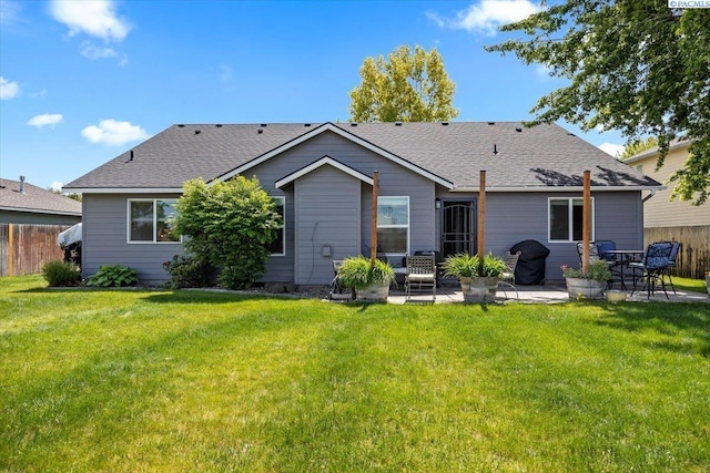 8602 W 1st Ave, Kennewick, WA 99336 - back of property with a patio and a shingled roof