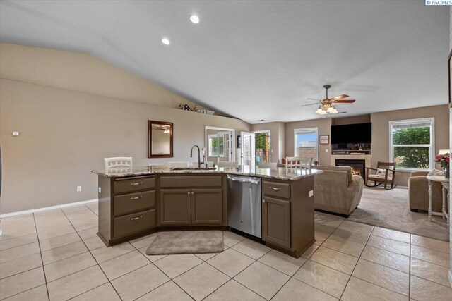 8602 W 1st Ave, Kennewick, WA 99336 - kitchen featuring dishwasher, vaulted ceiling, a sink, light tile patterned floors, and ceiling fan
