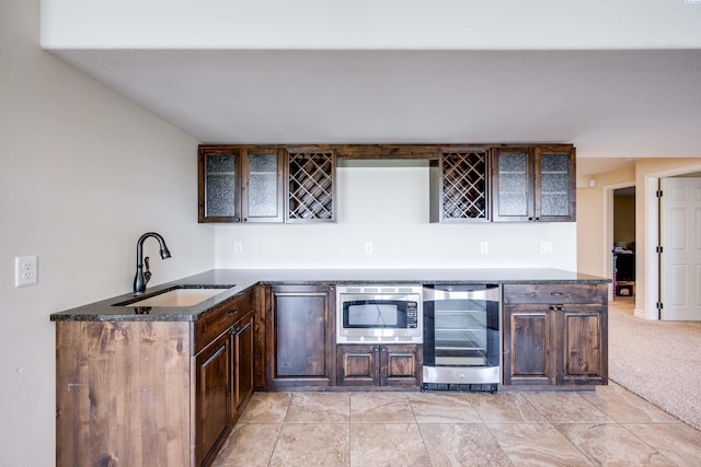 1105 SW Meyer Dr, Pullman, WA 99163 - bar featuring wine cooler and stainless steel microwave