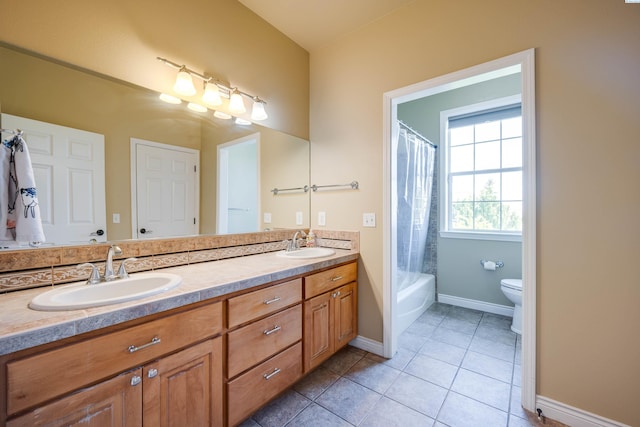 1105 SW Meyer Dr, Pullman, WA 99163 - full bath with double vanity, tile patterned flooring, and shower / bath combination with curtain