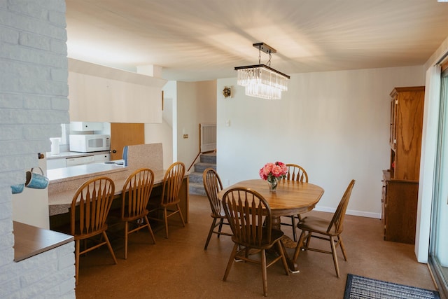 dining room with an inviting chandelier