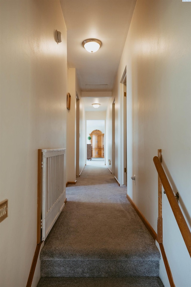 hall with light carpet