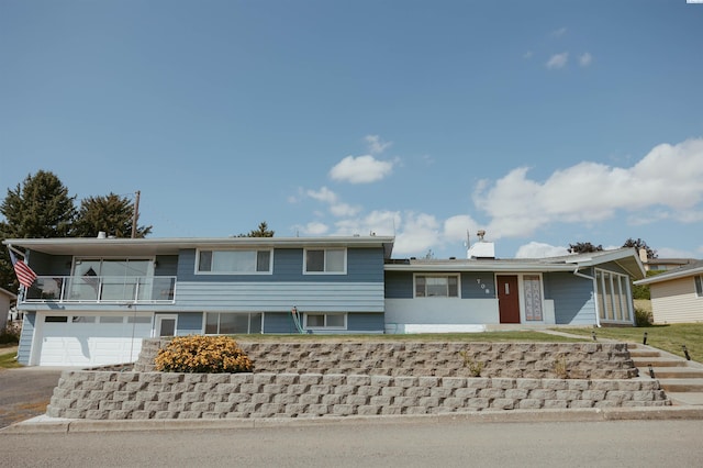 view of front of property with a balcony