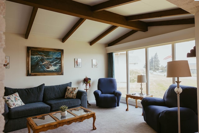 living room with lofted ceiling with beams and carpet floors