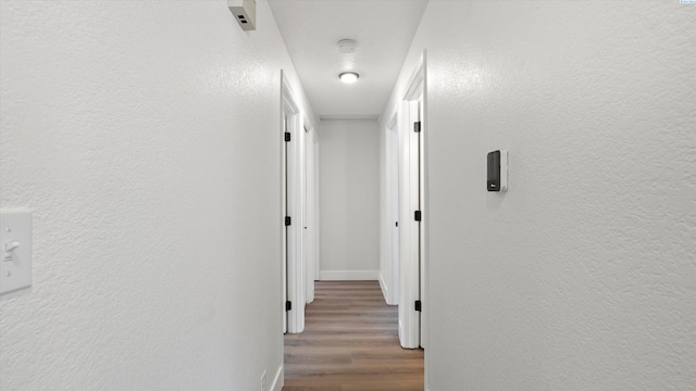 4308 S Sharron Ct, Kennewick, WA 99337 - corridor with wood finished floors and a textured wall