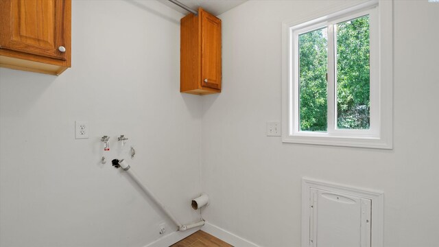 4308 S Sharron Ct, Kennewick, WA 99337 - laundry area featuring plenty of natural light and wood finished floors