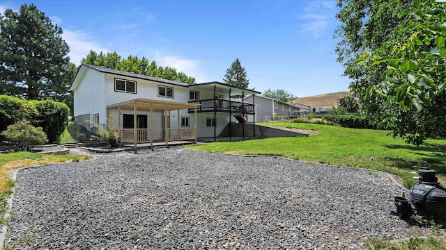 4308 S Sharron Ct, Kennewick, WA 99337 - rear view of house featuring a deck and a lawn