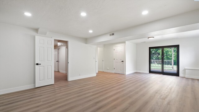 4308 S Sharron Ct, Kennewick, WA 99337 - unfurnished living room featuring light wood-style floors and recessed lighting
