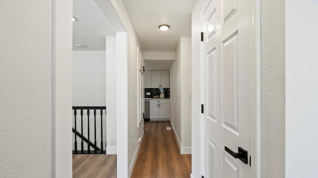 4308 S Sharron Ct, Kennewick, WA 99337 - corridor featuring wood finished floors and an upstairs landing