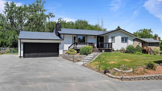 4308 S Sharron Ct, Kennewick, WA 99337 - ranch-style house featuring driveway, an attached garage, and a chimney