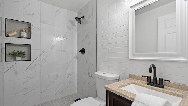 4308 S Sharron Ct, Kennewick, WA 99337 - bathroom featuring tile walls, vanity, a marble finish shower, and backsplash
