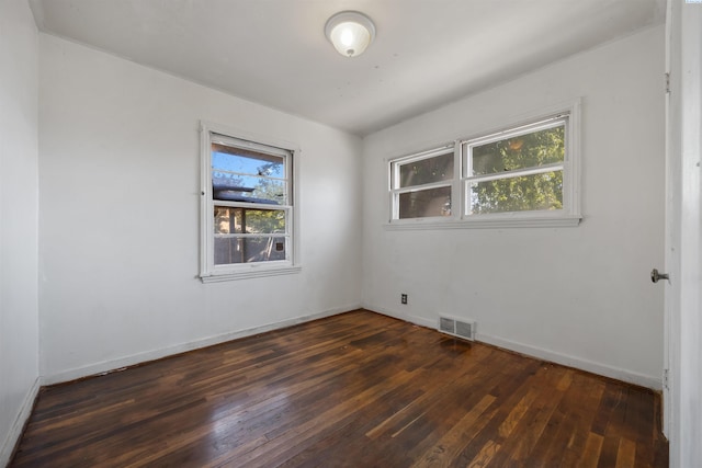 2018 W 2nd Ave, Kennewick, WA 99301 - spare room featuring hardwood / wood-style flooring and baseboards