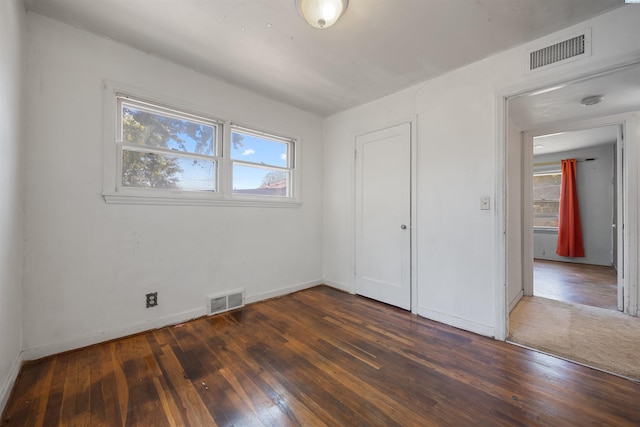 2018 W 2nd Ave, Kennewick, WA 99301 - unfurnished bedroom with dark wood-style flooring and a closet