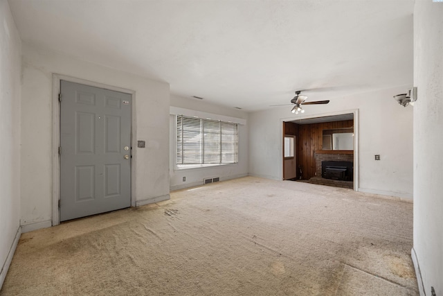 2018 W 2nd Ave, Kennewick, WA 99301 - unfurnished living room with ceiling fan and carpet flooring