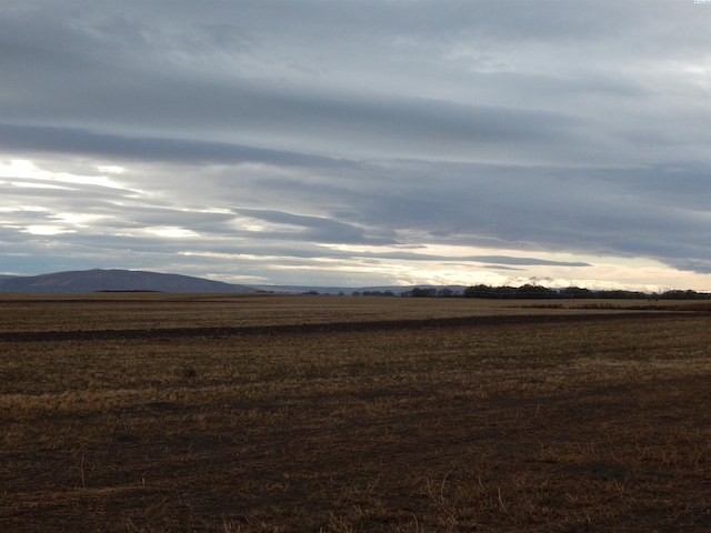 mountain view featuring a rural view