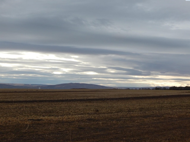 view of mountain feature featuring a rural view