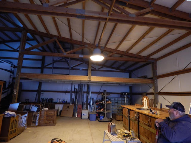 garage with a workshop area and a sink