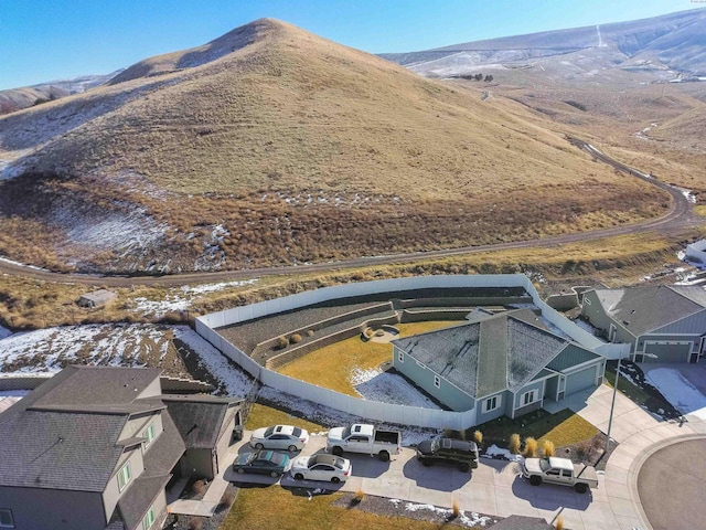 drone / aerial view featuring a mountain view