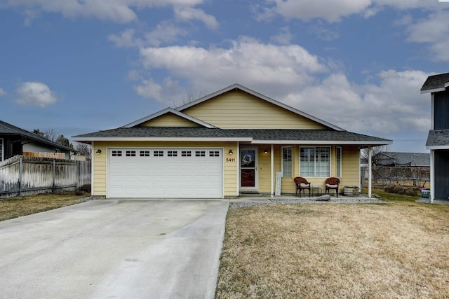 5411 Mays Ln, Pasco, WA 99301 - view of front of property featuring driveway, covered porch, an attached garage, and a shingled roof