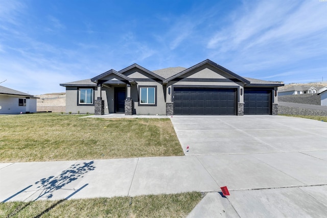 view of front of home with a garage, driveway, stucco siding, a front yard, and stone siding