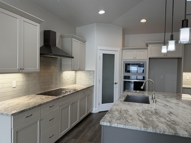 2730 Westhaven Ct, West Richland, WA 99353 - kitchen featuring backsplash, wall chimney range hood, light stone countertops, black appliances, and a sink