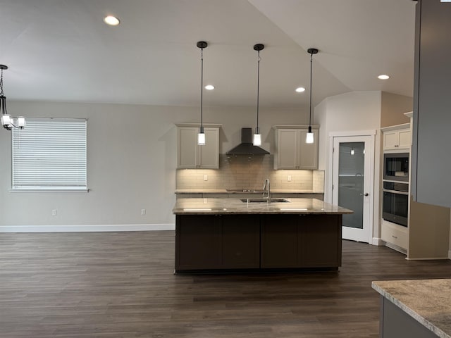 2730 Westhaven Ct, West Richland, WA 99353 - kitchen with built in microwave, stainless steel oven, decorative backsplash, wall chimney exhaust hood, and a sink