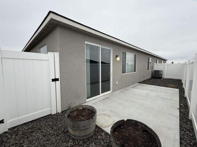 2730 Westhaven Ct, West Richland, WA 99353 - view of patio / terrace with central AC, a fenced backyard, and a gate