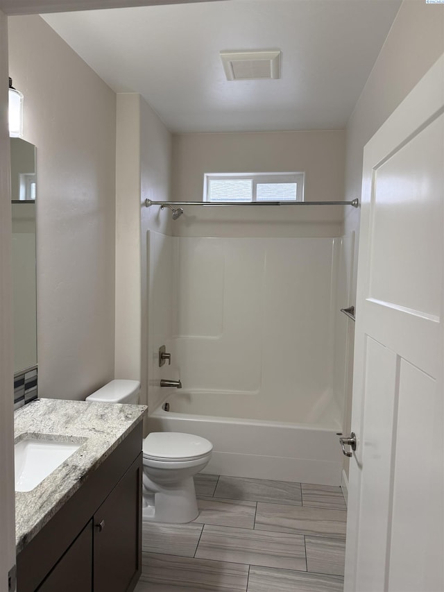 2730 Westhaven Ct, West Richland, WA 99353 - full bathroom featuring visible vents, toilet, vanity, and  shower combination