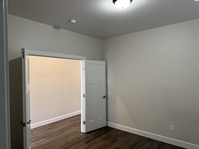 2730 Westhaven Ct, West Richland, WA 99353 - empty room featuring dark wood-type flooring and baseboards
