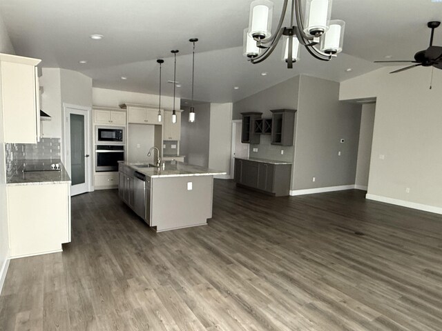 2730 Westhaven Ct, West Richland, WA 99353 - kitchen with a sink, dark wood finished floors, open floor plan, stainless steel appliances, and a kitchen island with sink
