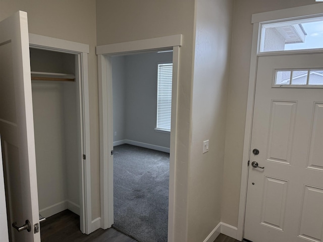 2730 Westhaven Ct, West Richland, WA 99353 - entryway with plenty of natural light, baseboards, and dark colored carpet
