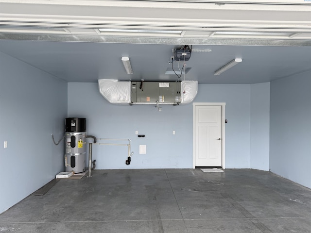 2730 Westhaven Ct, West Richland, WA 99353 - garage featuring water heater and a garage door opener
