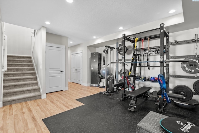 1430 Purple Sage St, Richland, WA 99352 - workout area featuring recessed lighting, wood finished floors, baseboards, and a textured ceiling