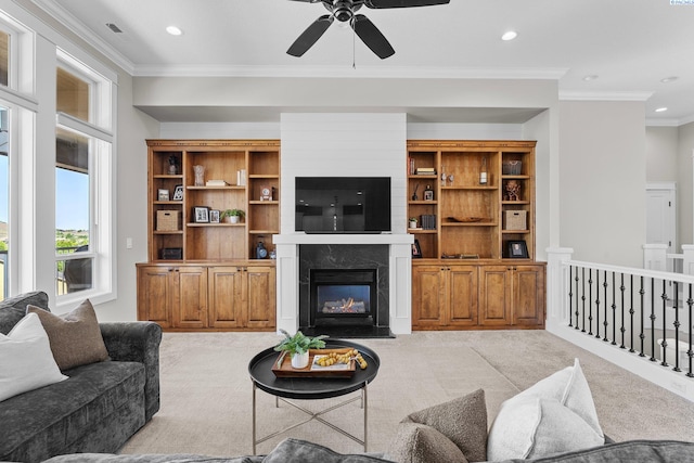 1430 Purple Sage St, Richland, WA 99352 - living area featuring light carpet, a ceiling fan, crown molding, a high end fireplace, and recessed lighting