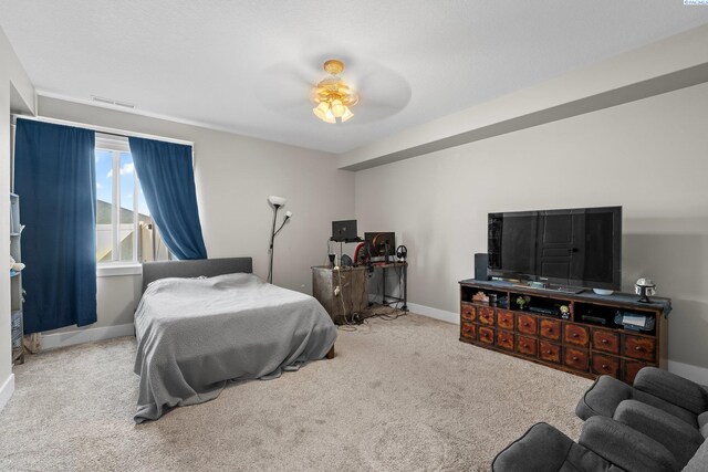 1430 Purple Sage St, Richland, WA 99352 - carpeted bedroom with baseboards and ceiling fan