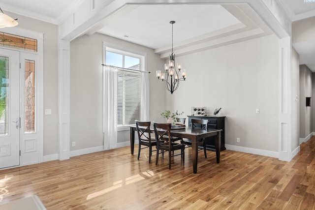 1430 Purple Sage St, Richland, WA 99352 - dining room featuring light wood-style flooring, a chandelier, baseboards, and ornamental molding