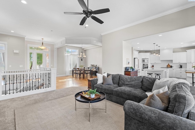1430 Purple Sage St, Richland, WA 99352 - living area with a chandelier, light wood-style flooring, recessed lighting, crown molding, and ceiling fan