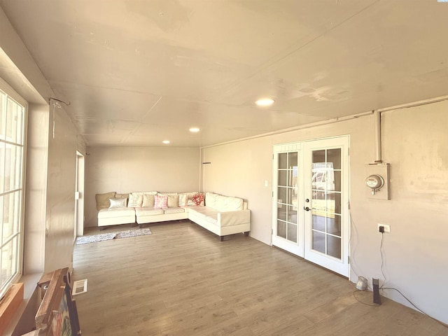 227 E 5th Ave, Kennewick, WA 99336 - living room featuring french doors, recessed lighting, wood finished floors, and visible vents