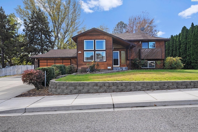 view of front facade featuring a front yard