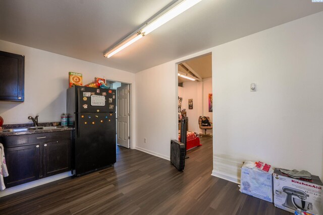 742 E 4th Ave, Kennewick, WA 99336 - interior space with dark wood-type flooring, a sink, and baseboards