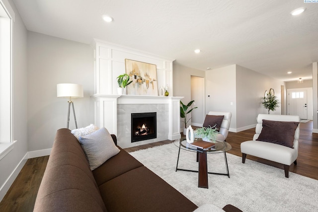 8717 Ashen Dr, Pasco, WA 99301 - living room featuring baseboards, wood finished floors, and recessed lighting