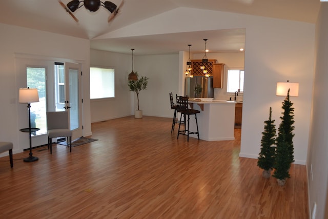 1205 SW Hannah St, Pullman, WA 99163 - living room with light wood-style floors, plenty of natural light, and lofted ceiling