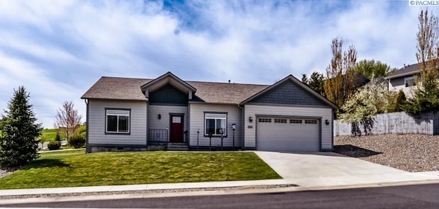 1205 SW Hannah St, Pullman, WA 99163 - ranch-style house featuring a garage, driveway, and a front yard