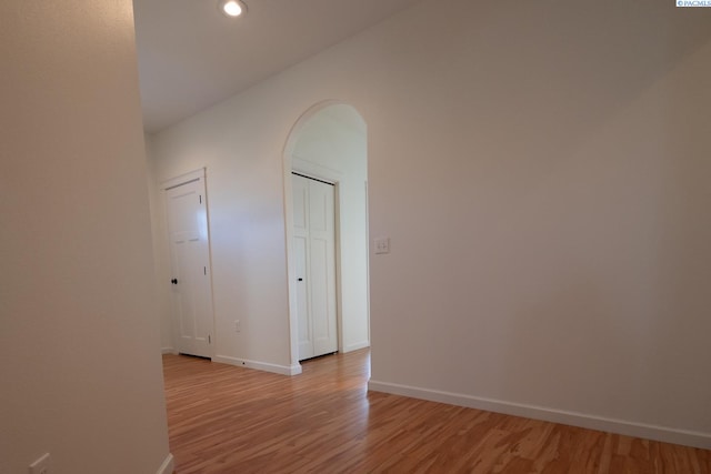 1205 SW Hannah St, Pullman, WA 99163 - spare room with baseboards, arched walkways, light wood finished floors, and recessed lighting
