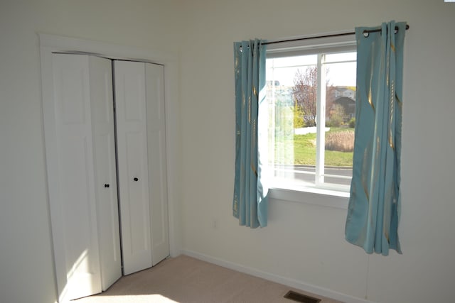 1205 SW Hannah St, Pullman, WA 99163 - unfurnished bedroom featuring visible vents, carpet, baseboards, and a closet